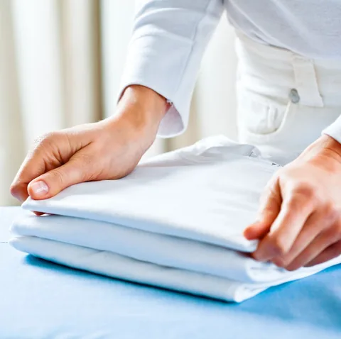 Pressing and finishing a white shirt